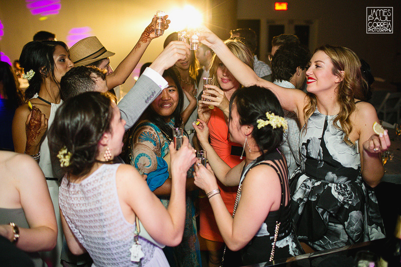 wedding guests taking shots