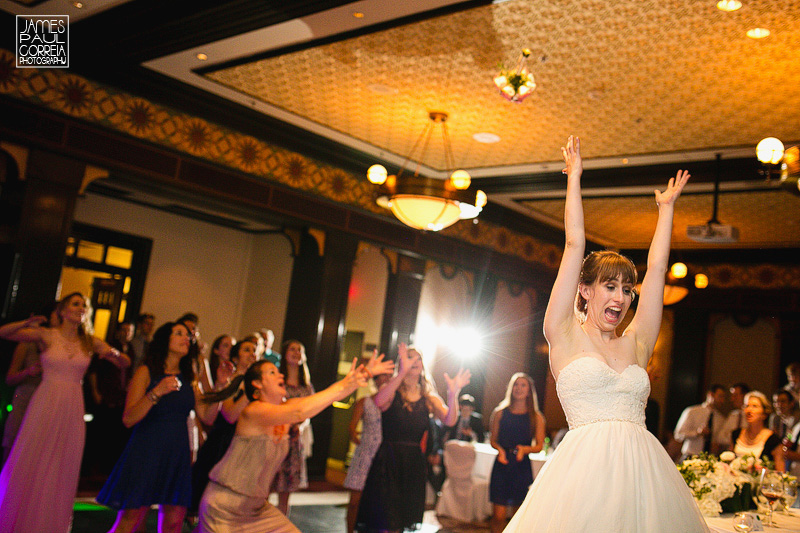 bouquet toss wedding photographer