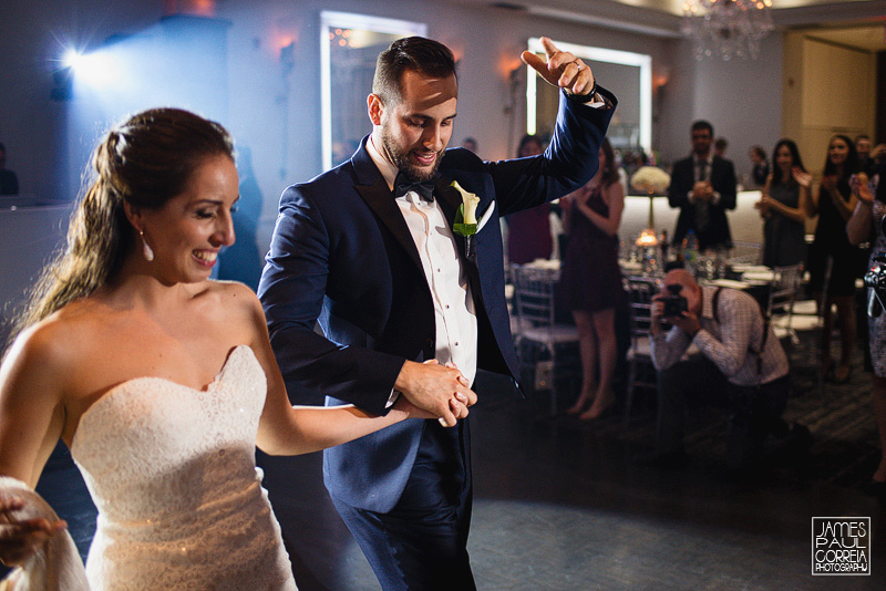 bride and groom entering le crystal wedding venue