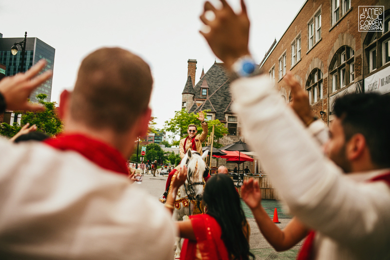 south asian wedding groom on horse