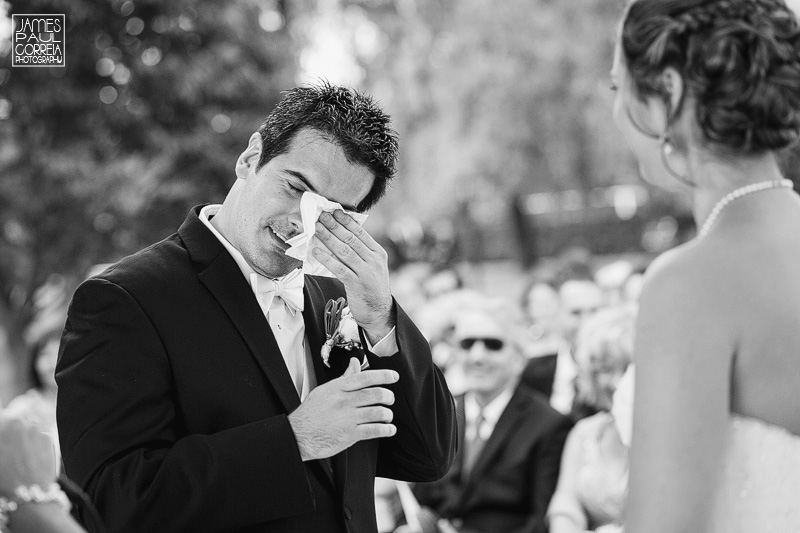 montreal wedding photographer groom wipes away tear