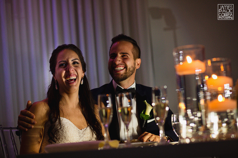 speech reaction photo of bride and groom