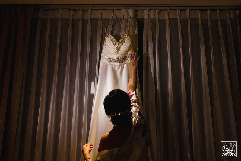 bride grabbing dress