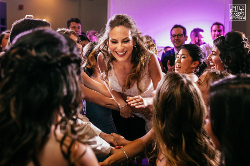 jewish hora toronto wedding photographer lifting on arms